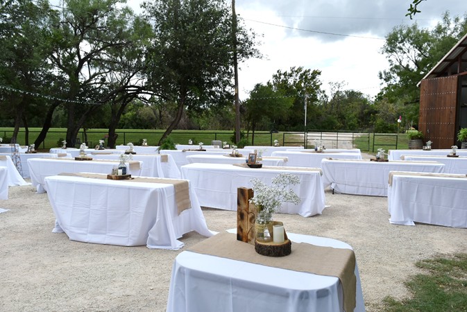 "View Of Tables Across Driveway"