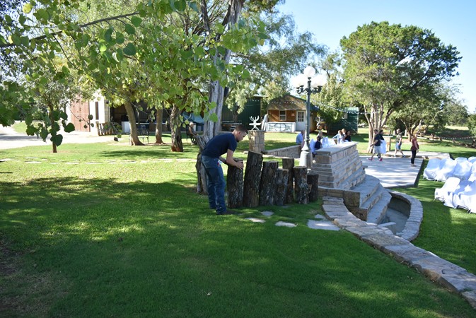 "Josh The Groom Starts Log Set Up"