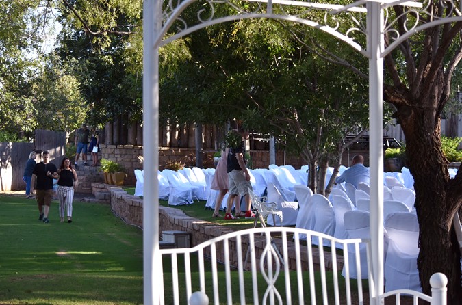 "Wedding Party Exits Rock Steps On Lower Level"