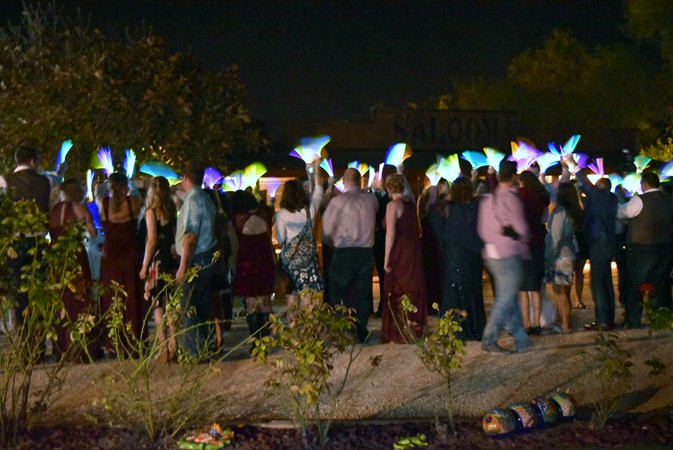 "Glow Stick Line Up For Send Off"