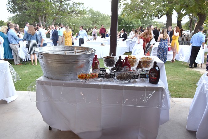 "Ice Cream In Tub & Sundae Toppings Ready To Go"